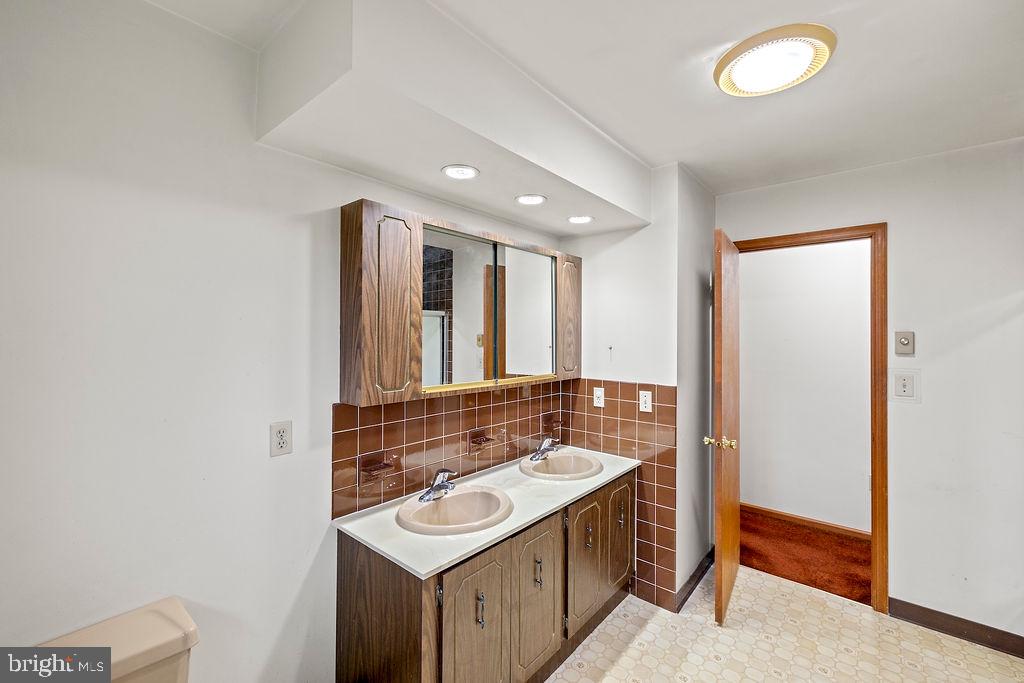 2165 Old Harrisburg Road Gettysburg, PA 17325 - Photo 11 of 44 a bathroom with a sink and a mirror