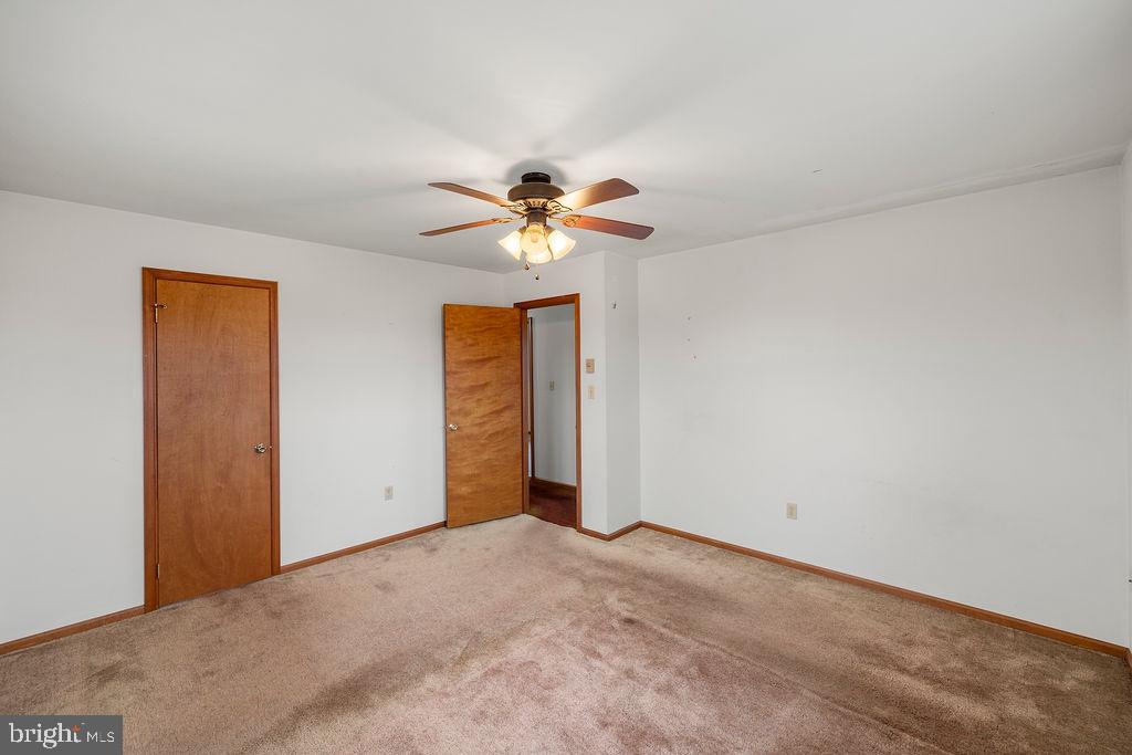 2165 Old Harrisburg Road Gettysburg, PA 17325 - Photo 13 of 44 a view of an empty room with chandelier fan