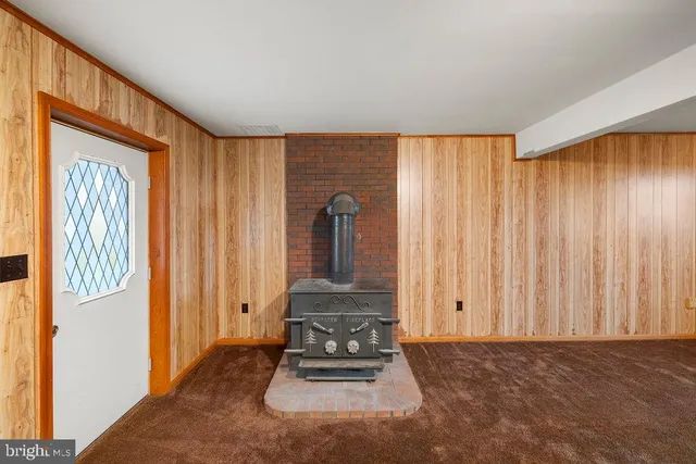 a view of a hallway with front door