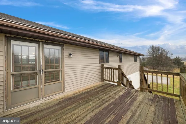 a view of deck having patio