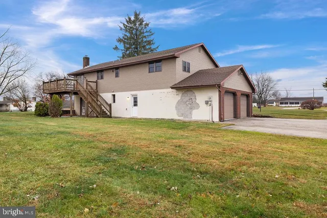 a front view of a house with yard