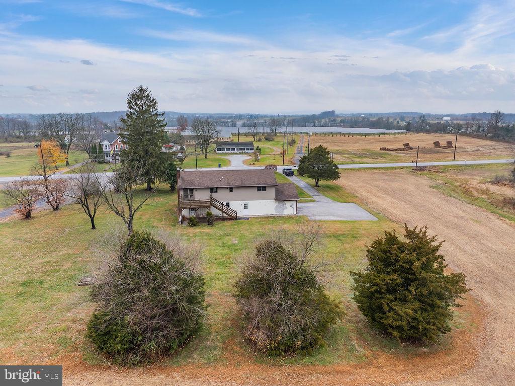 2165 Old Harrisburg Road Gettysburg, PA 17325 - Photo 39 of 44 a view of a swimming pool with an outdoor seating and a lots of trees