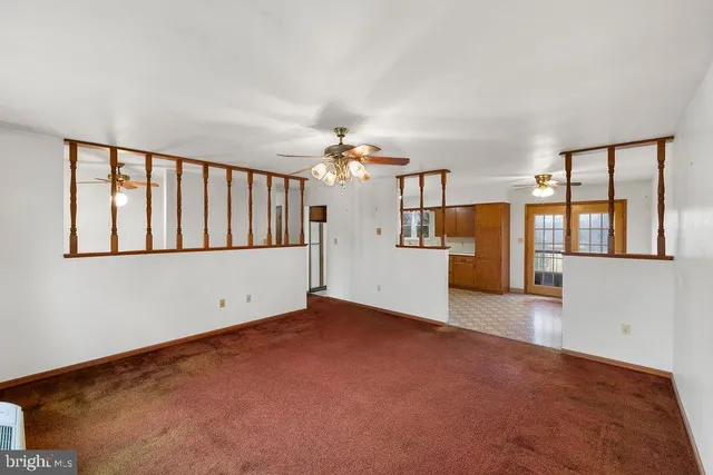 a view of a kitchen with a sink