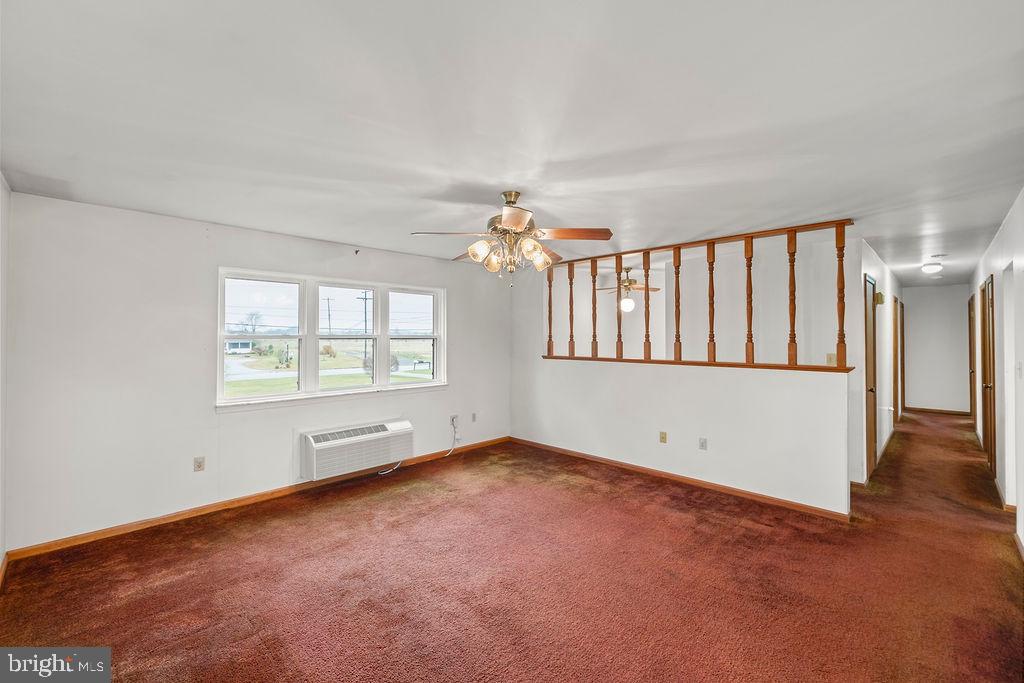 2165 Old Harrisburg Road Gettysburg, PA 17325 - Photo 9 of 44 wooden floor in an empty room with a window