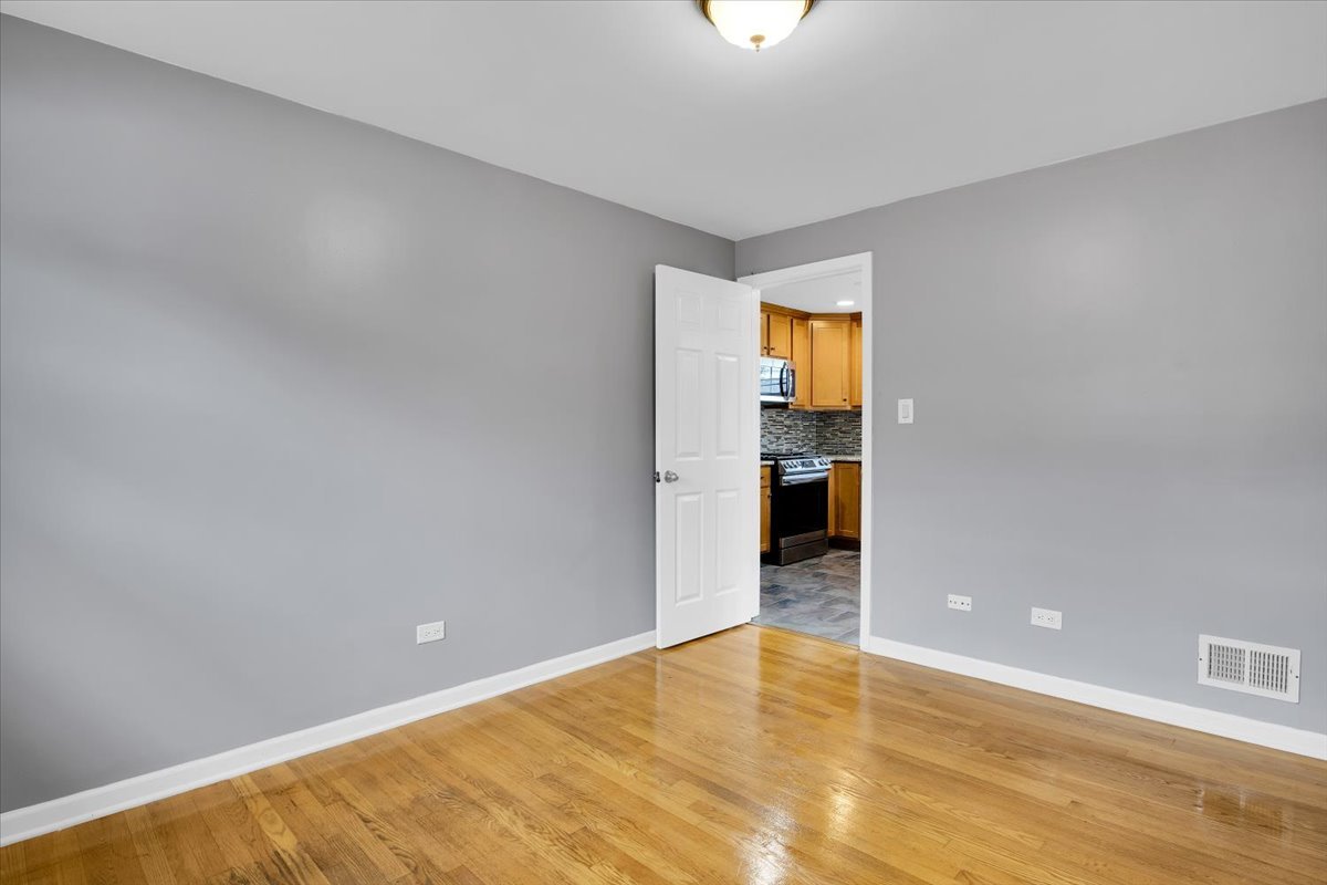 10822 Major Avenue Chicago Ridge, IL 60415 - Photo 16 of 30 a view of an empty room with a window