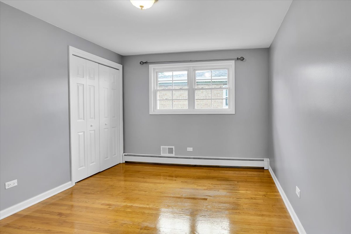 10822 Major Avenue Chicago Ridge, IL 60415 - Photo 17 of 30 a view of an empty room with window