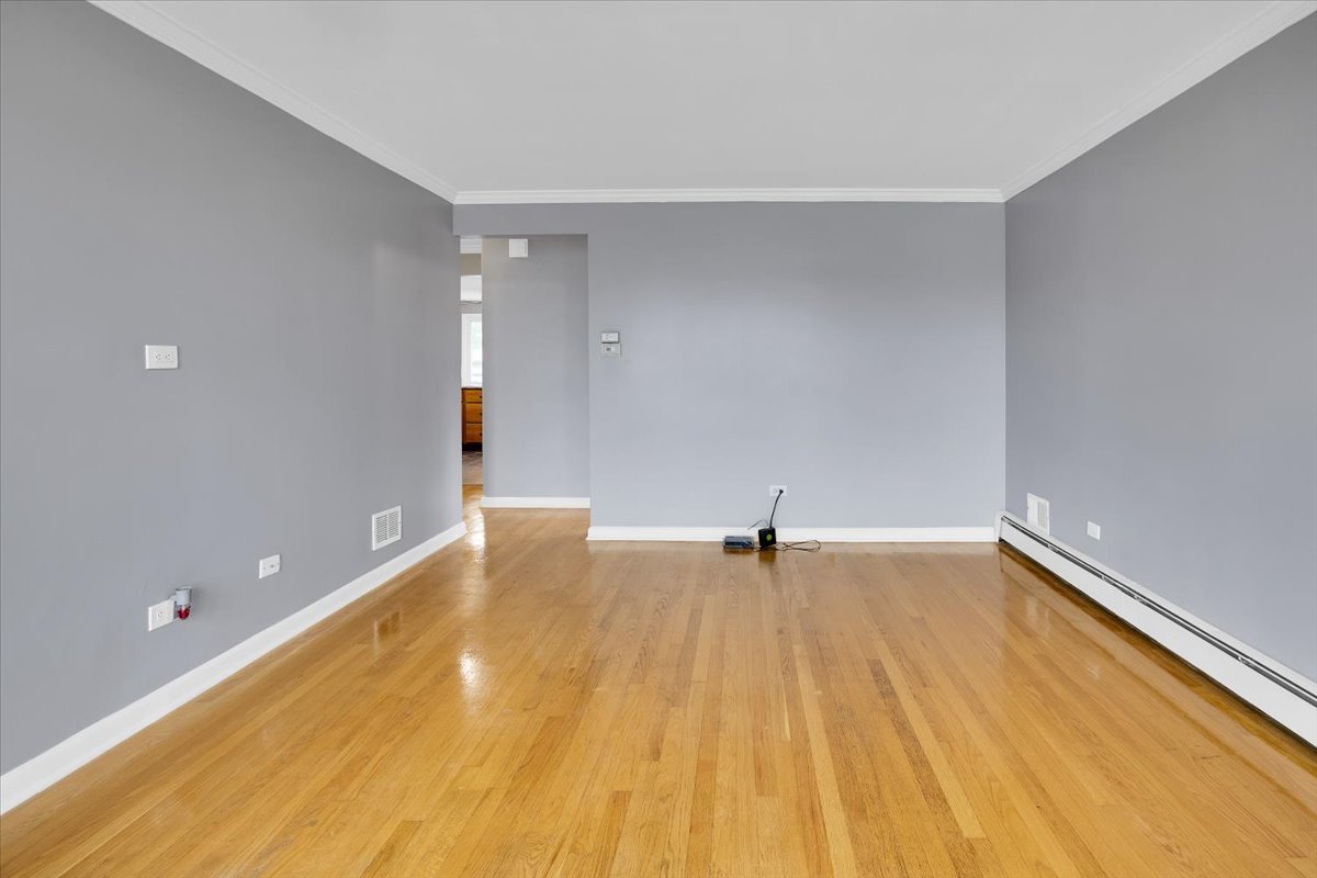 10822 Major Avenue Chicago Ridge, IL 60415 - Photo 8 of 30 a view of an empty room with wooden floor