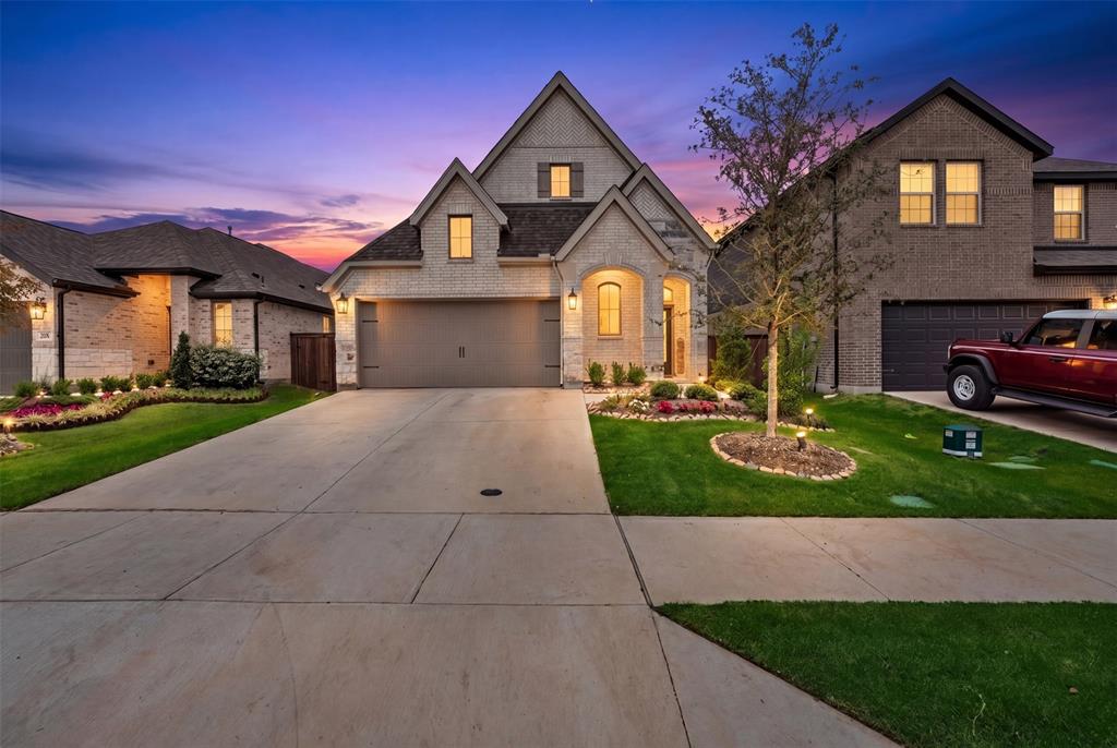 228 Palo Duro Bend Rhome, TX 76078 - Photo 1 of 35 a front view of a house with a yard