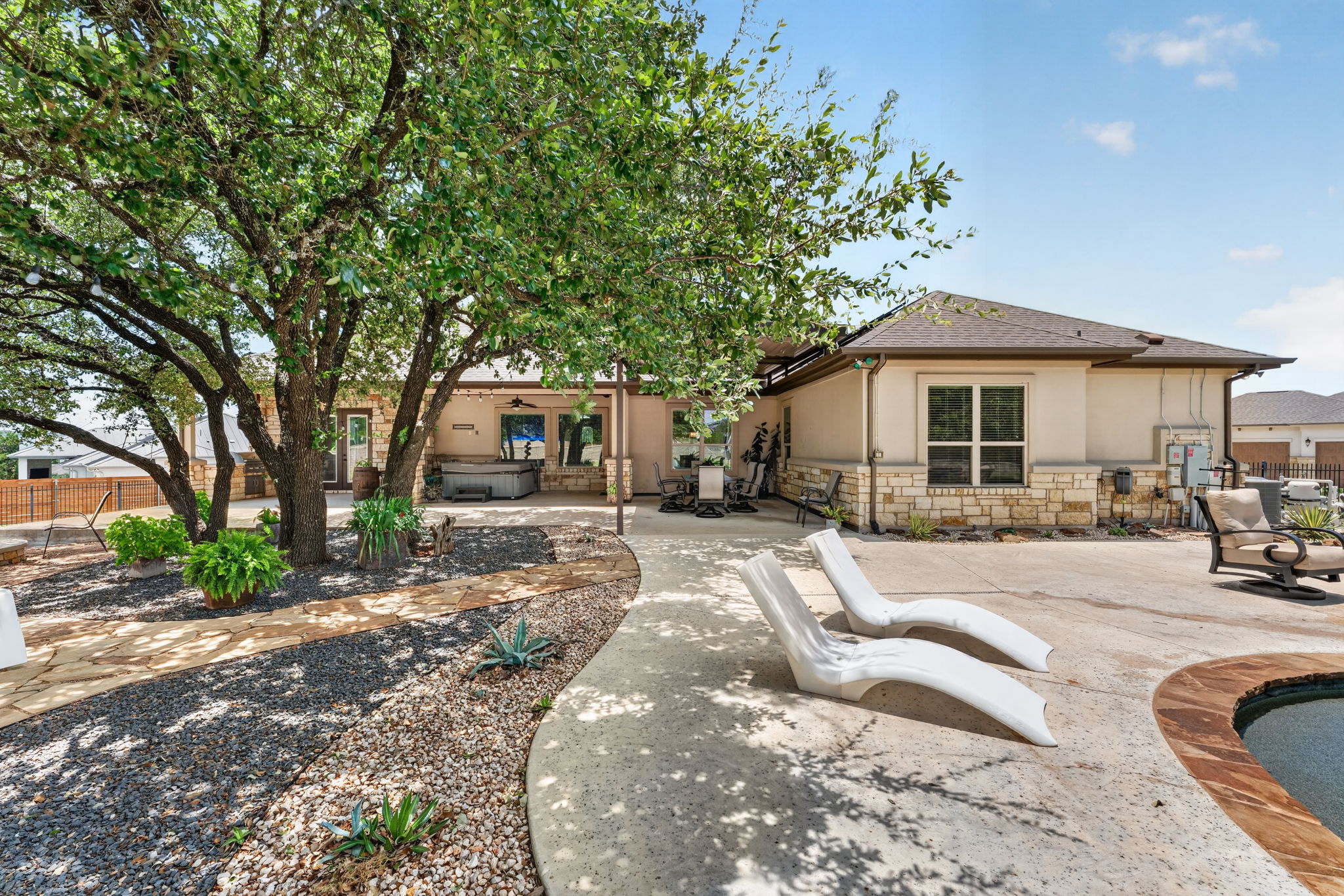 105 Coopers Hill Road Georgetown, TX 78633 - Photo 35 of 40 a front view of a house with a yard and potted plants