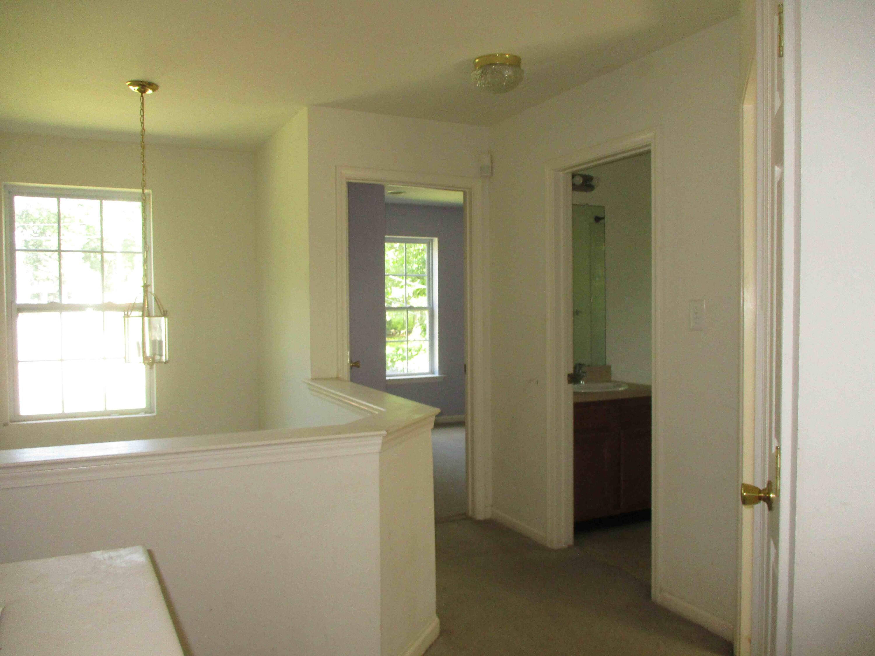 2113 Dorset Court Bushkill, PA 18324 - Photo 4 of 10 a view of an empty room and window