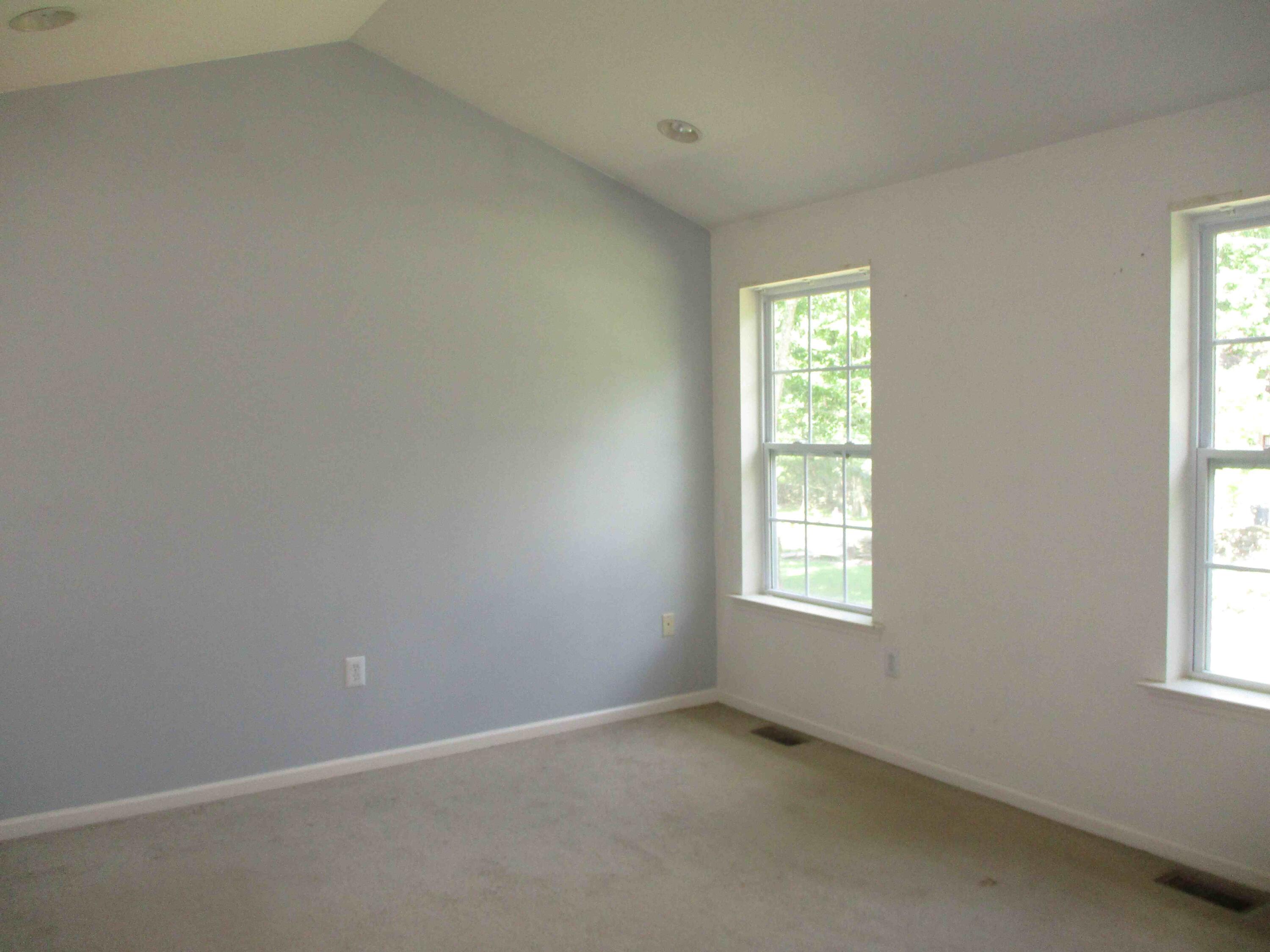 2113 Dorset Court Bushkill, PA 18324 - Photo 6 of 10 an empty room with windows