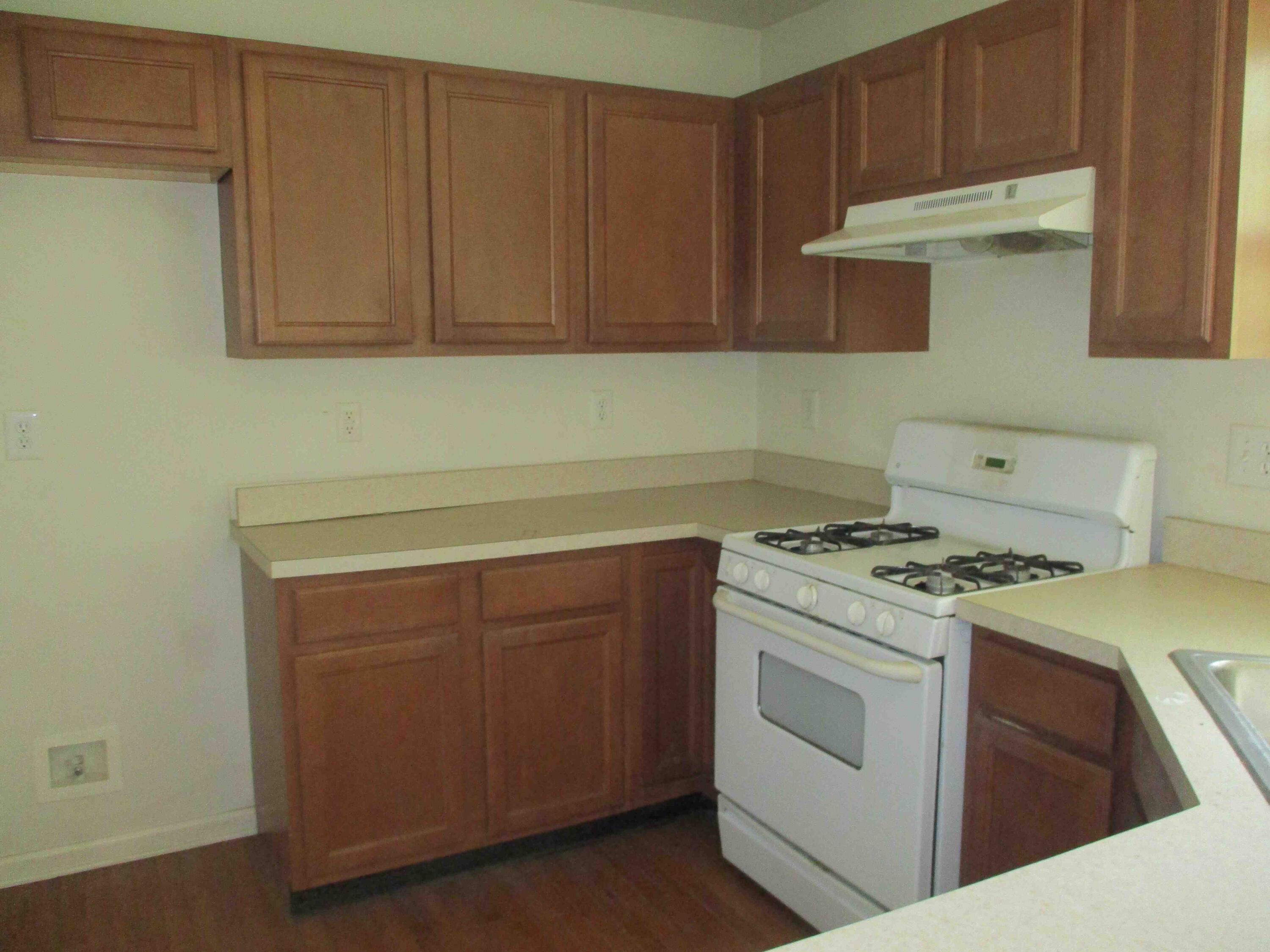 2113 Dorset Court Bushkill, PA 18324 - Photo 10 of 10 a kitchen with a stove and a sink