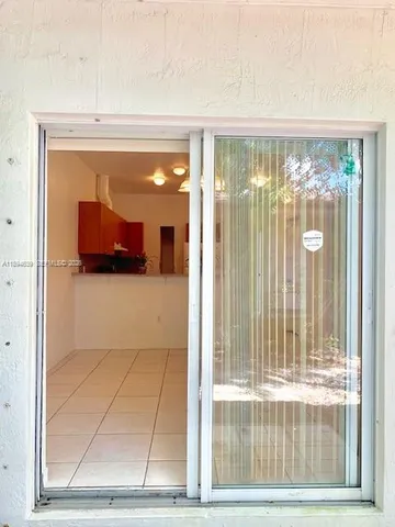 a view of balcony with a small yard