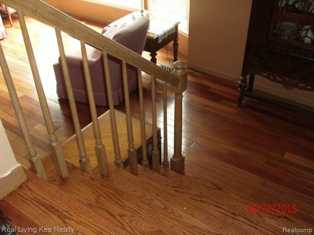5754 Kennebunk Drive Rochester, MI 48306 - Photo 7 of 28 Hardwood floors and staircase.jpg