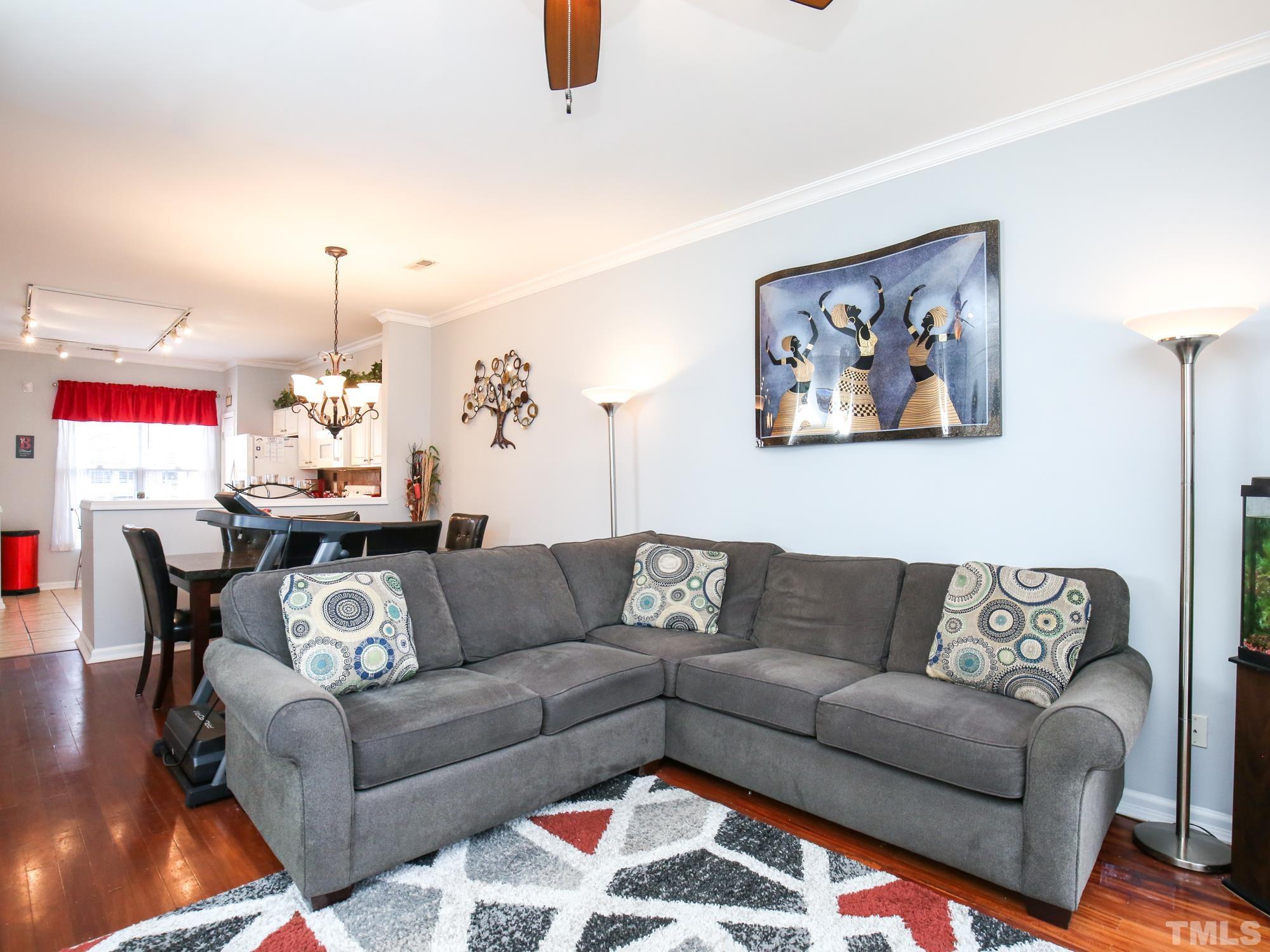 1714 Sorrell Brook Way Raleigh, NC 27609 - Photo 12 of 29 a living room with furniture and a couch