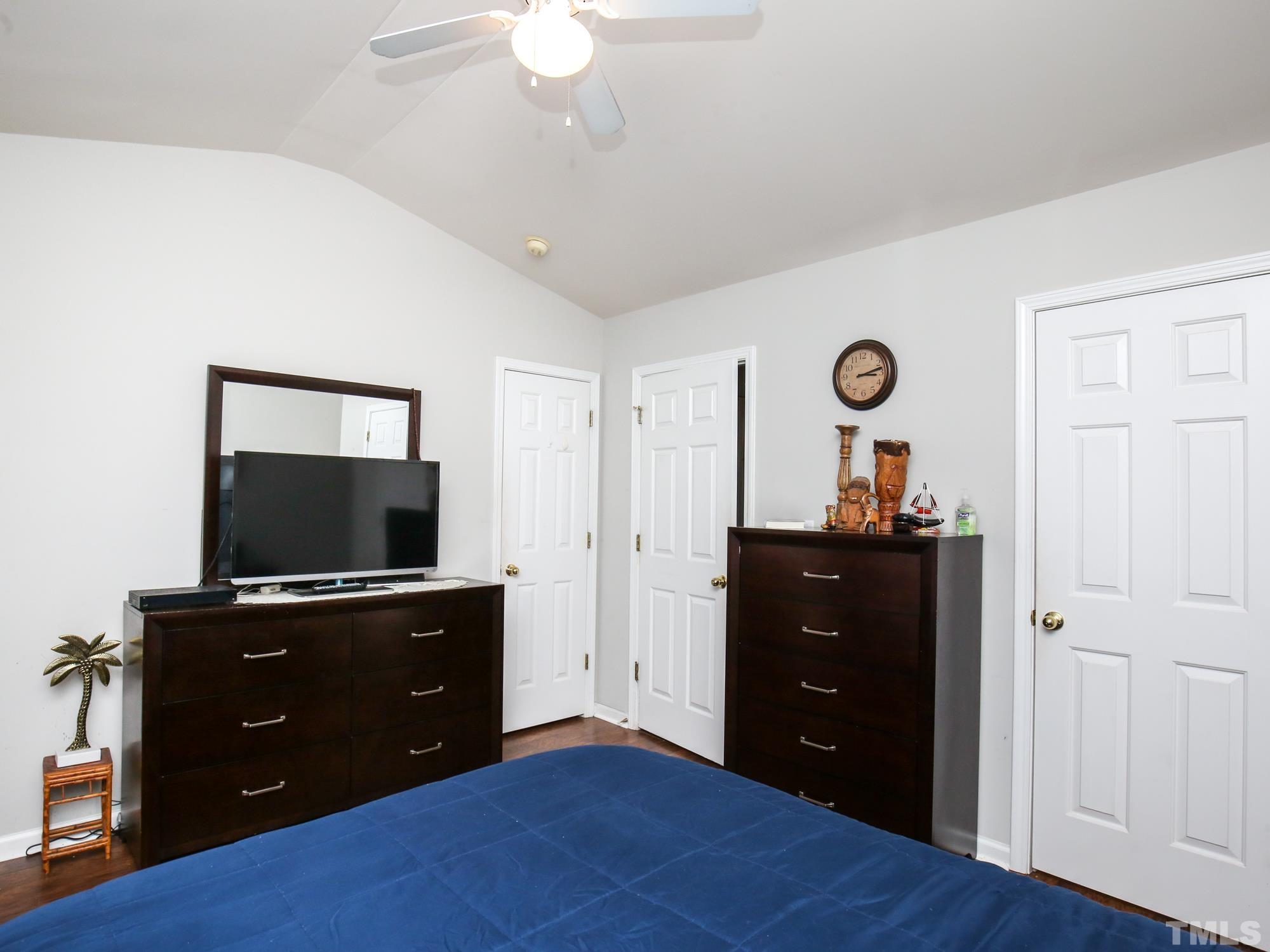 1714 Sorrell Brook Way Raleigh, NC 27609 - Photo 15 of 29 a living room with furniture and a flat screen tv