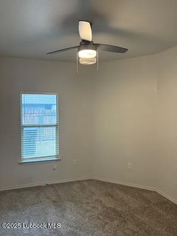 a view of kitchen with refrigerator stove and microwave