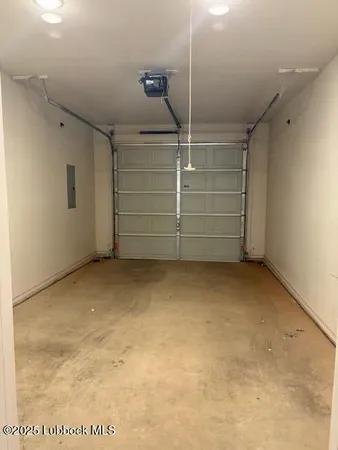 a view of hallway with a bathroom and a sink