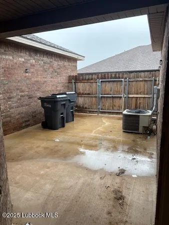 a bathroom with a toilet and a bathtub