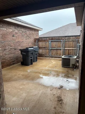 a bathroom with a toilet and a bathtub