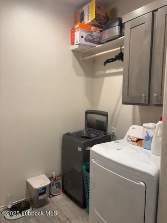 a kitchen with stainless steel appliances granite countertop a sink a stove and a wooden floor