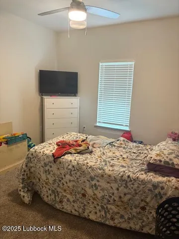 a view of a hallway with a white walls