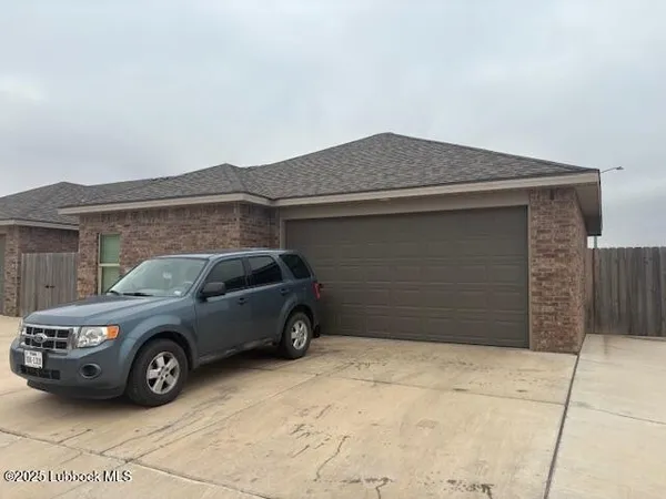 a bedroom with a bed and chair