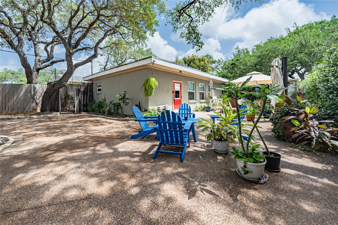 102 South 7th Street Fulton, TX 78358 - Photo 1 of 40 a view of a porch with furniture and a fire pit