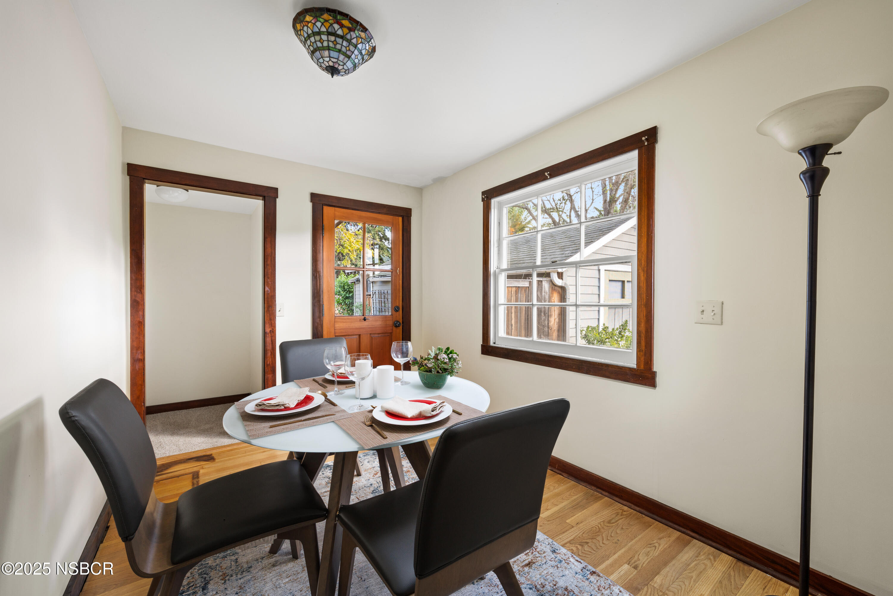 616 Alisal Road Solvang, CA 93463 - Photo 13 of 35 a view of a dining room with furniture window and outside view