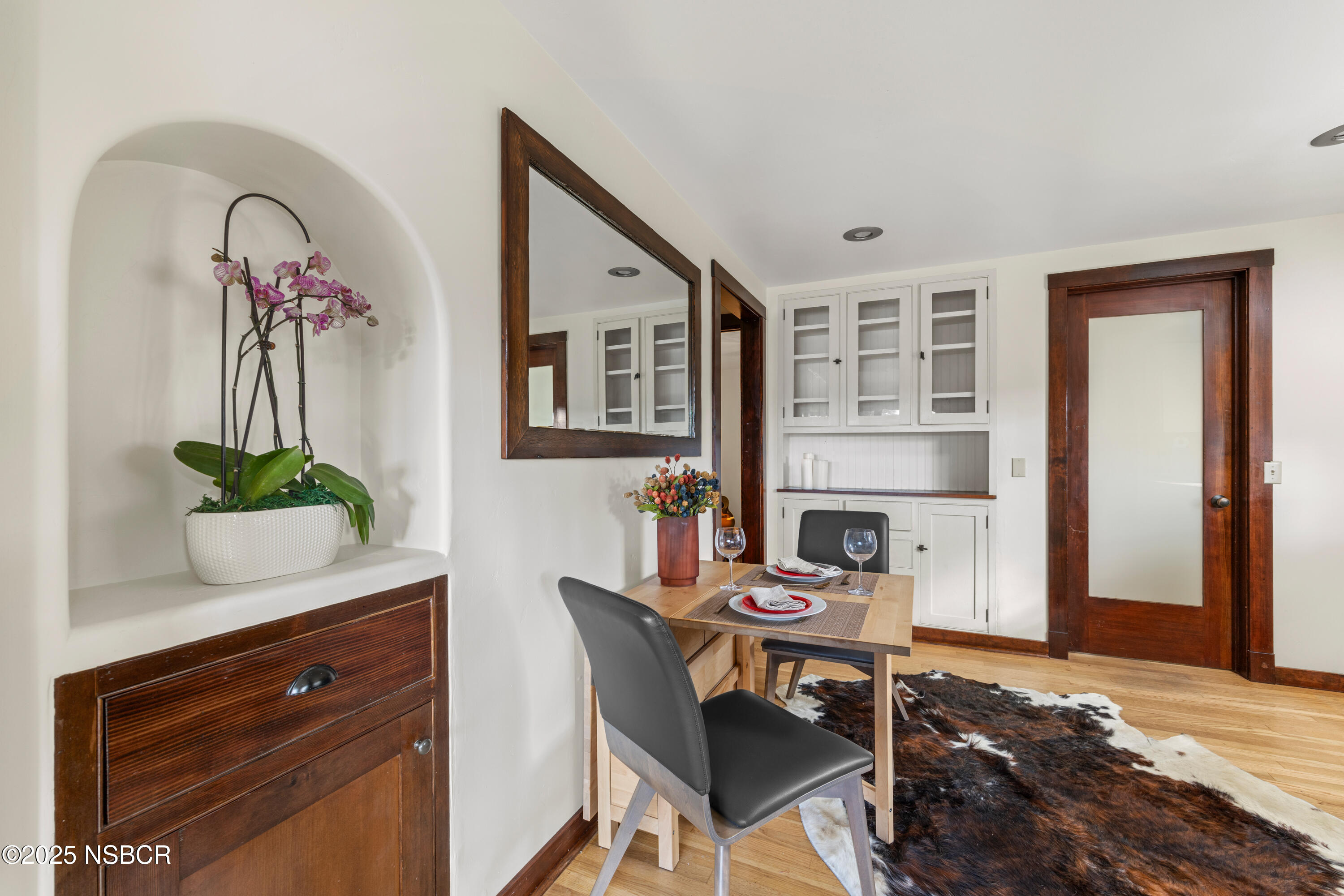 616 Alisal Road Solvang, CA 93463 - Photo 15 of 35 a livingroom with a table and chairs