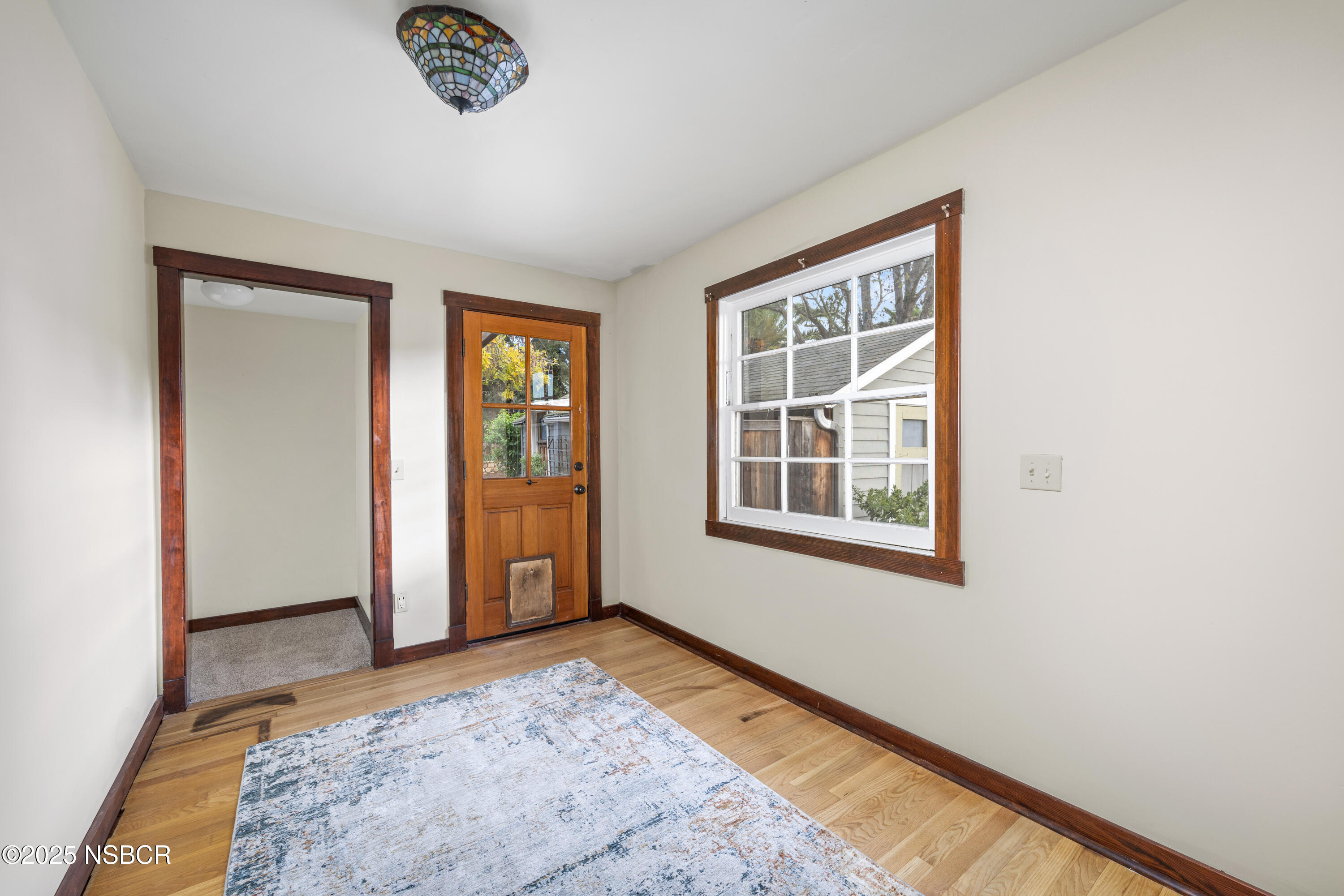 616 Alisal Road Solvang, CA 93463 - Photo 26 of 35 a view of an empty room with a window