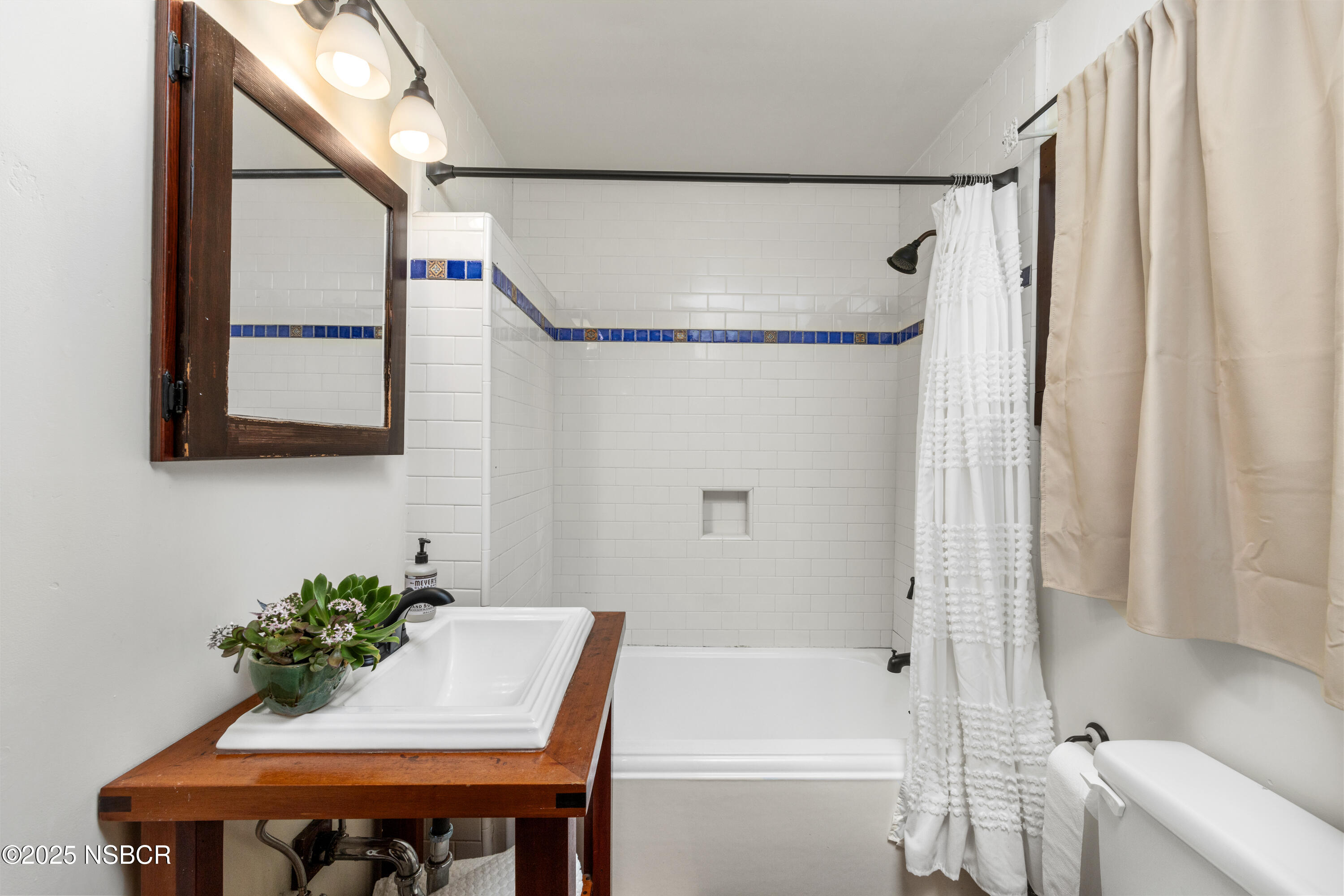 616 Alisal Road Solvang, CA 93463 - Photo 10 of 35 a bath room with a sink and a bath tub