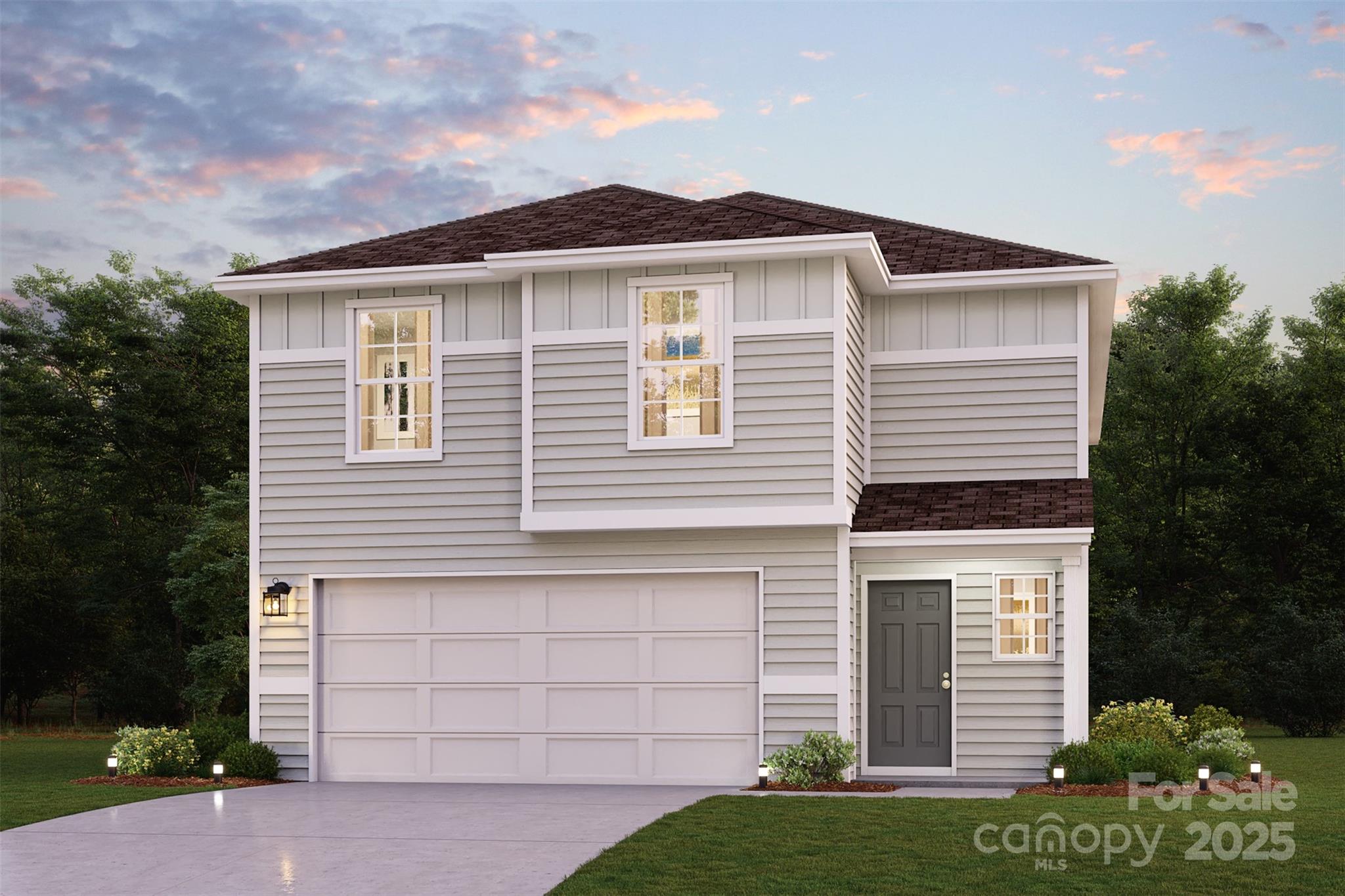 8906 Legendary Lane Inman, SC 29349 - Photo 1 of 3 a front view of a house with a garden