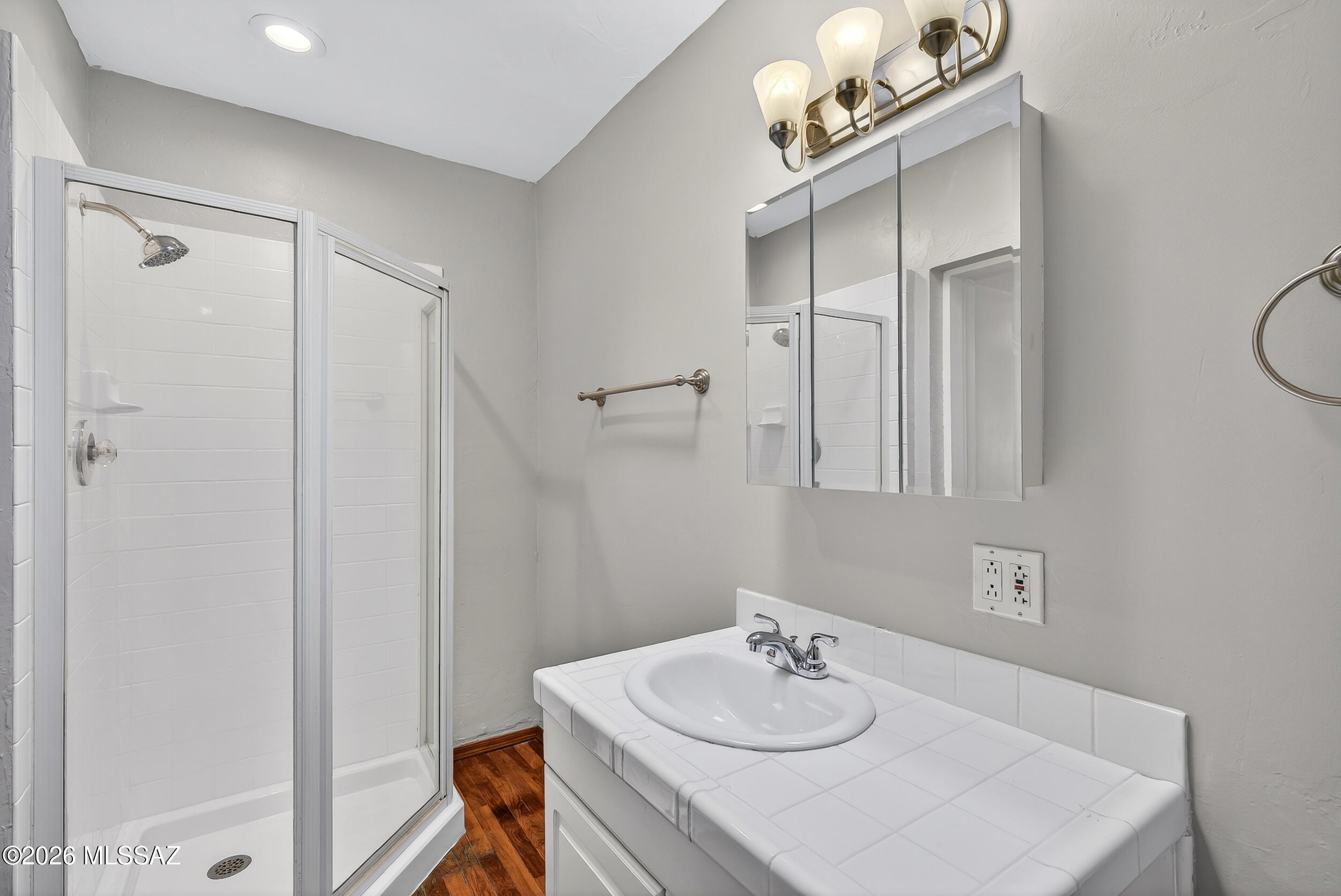 1412 East Spring Street Tucson, AZ 85719 - Photo 27 of 43 a bathroom with a sink vanity and a mirror