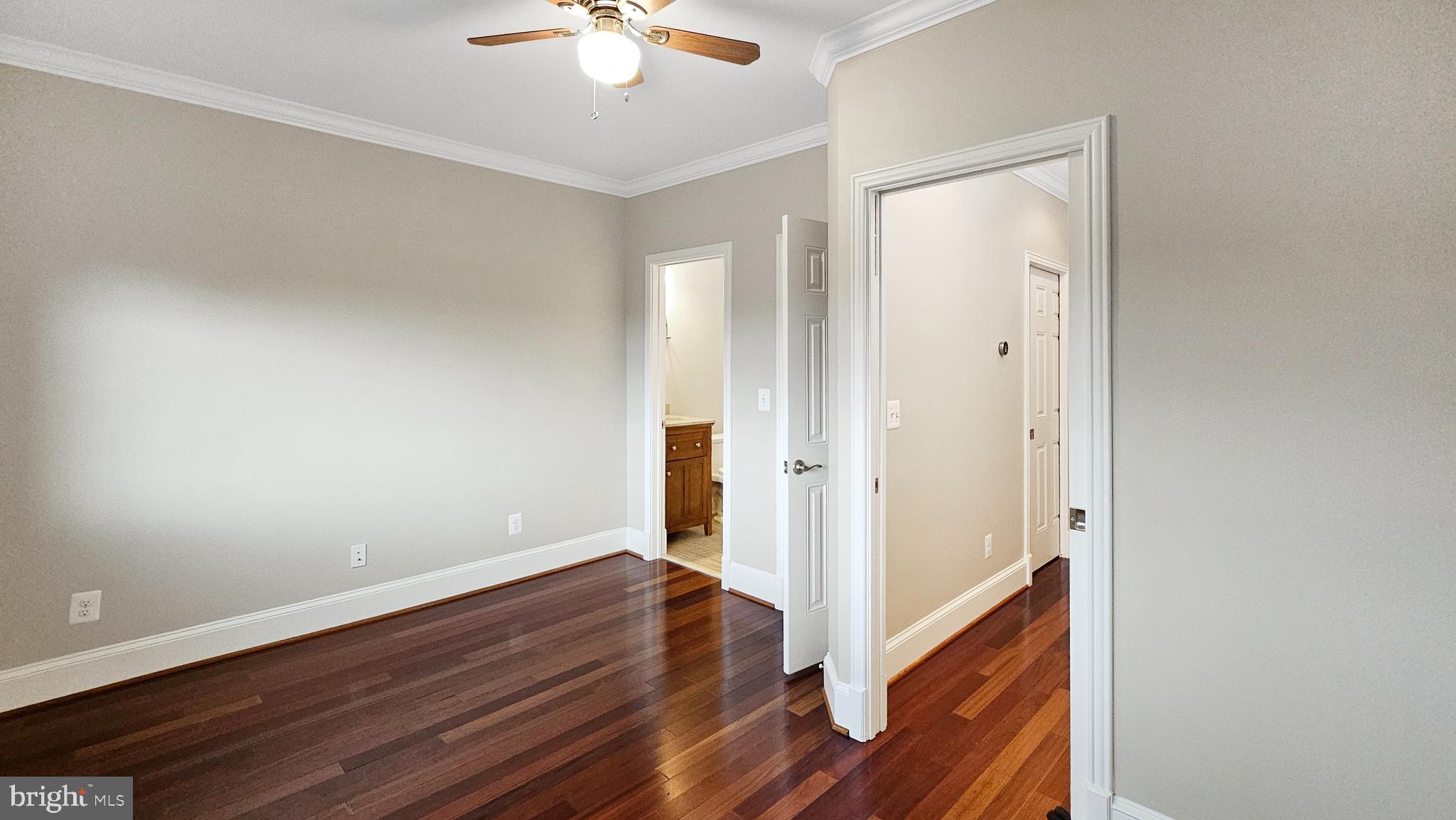 1834 Massachusetts Avenue Southeast Washington, DC 20003 - Photo 13 of 25 wooden floor in an empty room with a window