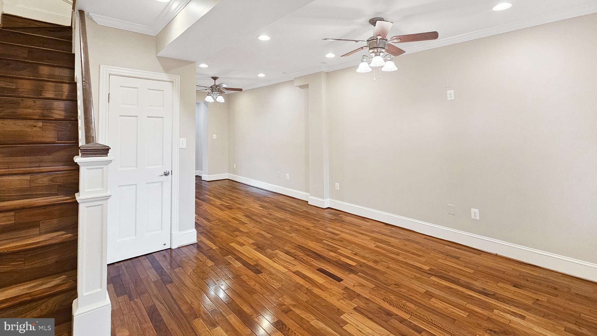 1834 Massachusetts Avenue Southeast Washington, DC 20003 - Photo 3 of 25 wooden floor in an empty room with a window