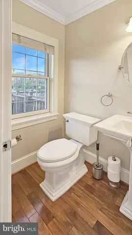 a bathroom with a toilet and a sink