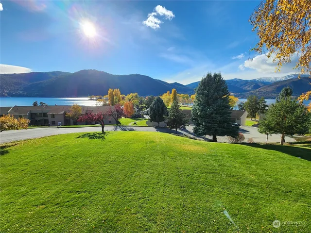 a view of a house with a big yard