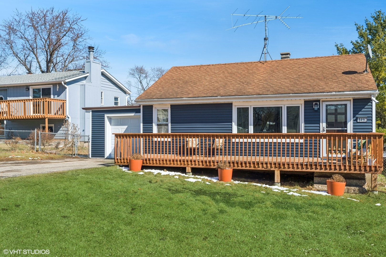 front view of a house with a deck