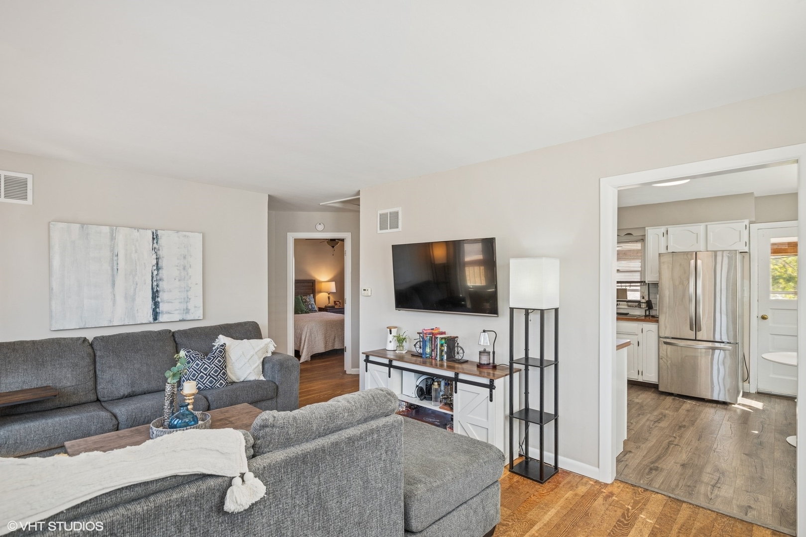 5414 Thelen Drive McHenry, IL 60051 - Photo 3 of 18 a living room with furniture and a flat screen tv