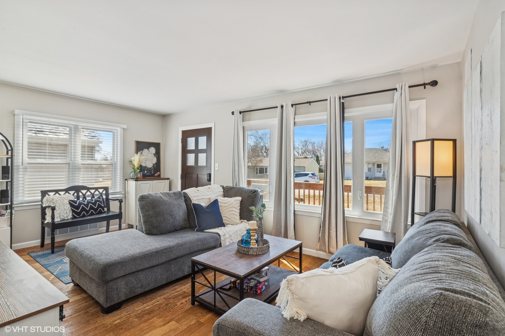 5414 Thelen Drive McHenry, IL 60051 - Photo 5 of 18 a living room with furniture and a large window