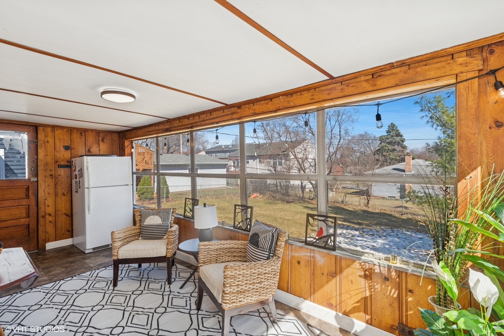 5414 Thelen Drive McHenry, IL 60051 - Photo 9 of 18 a living room with furniture and a floor to ceiling window