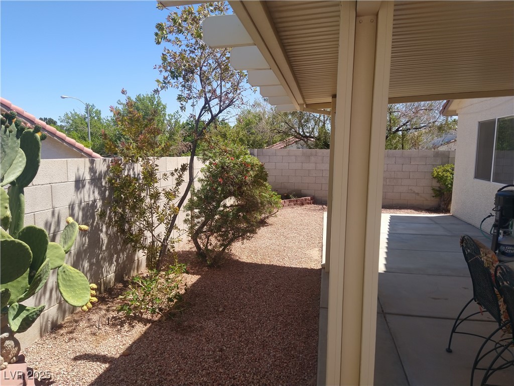 2148 Hidden Ranch Terrace Henderson, NV 89052 - Photo 14 of 31 View of yard featuring a fenced backyard and a patio area
