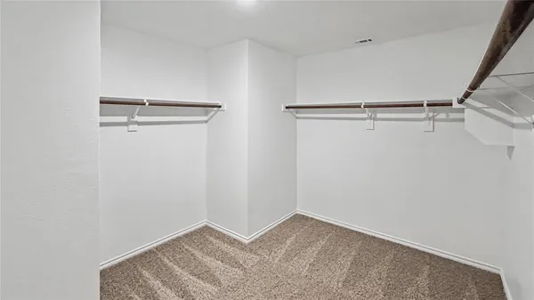 a view of small space with racks on the wall