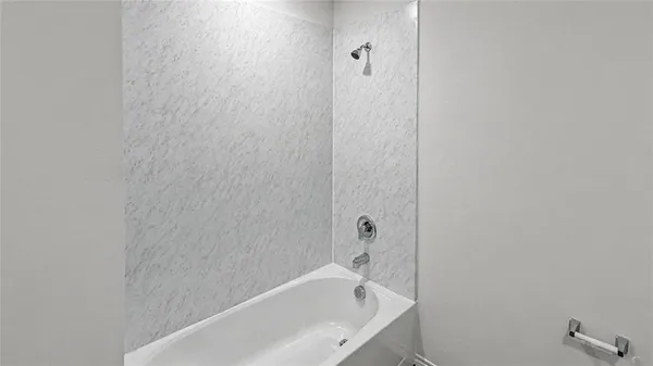 a bathroom with a bathtub