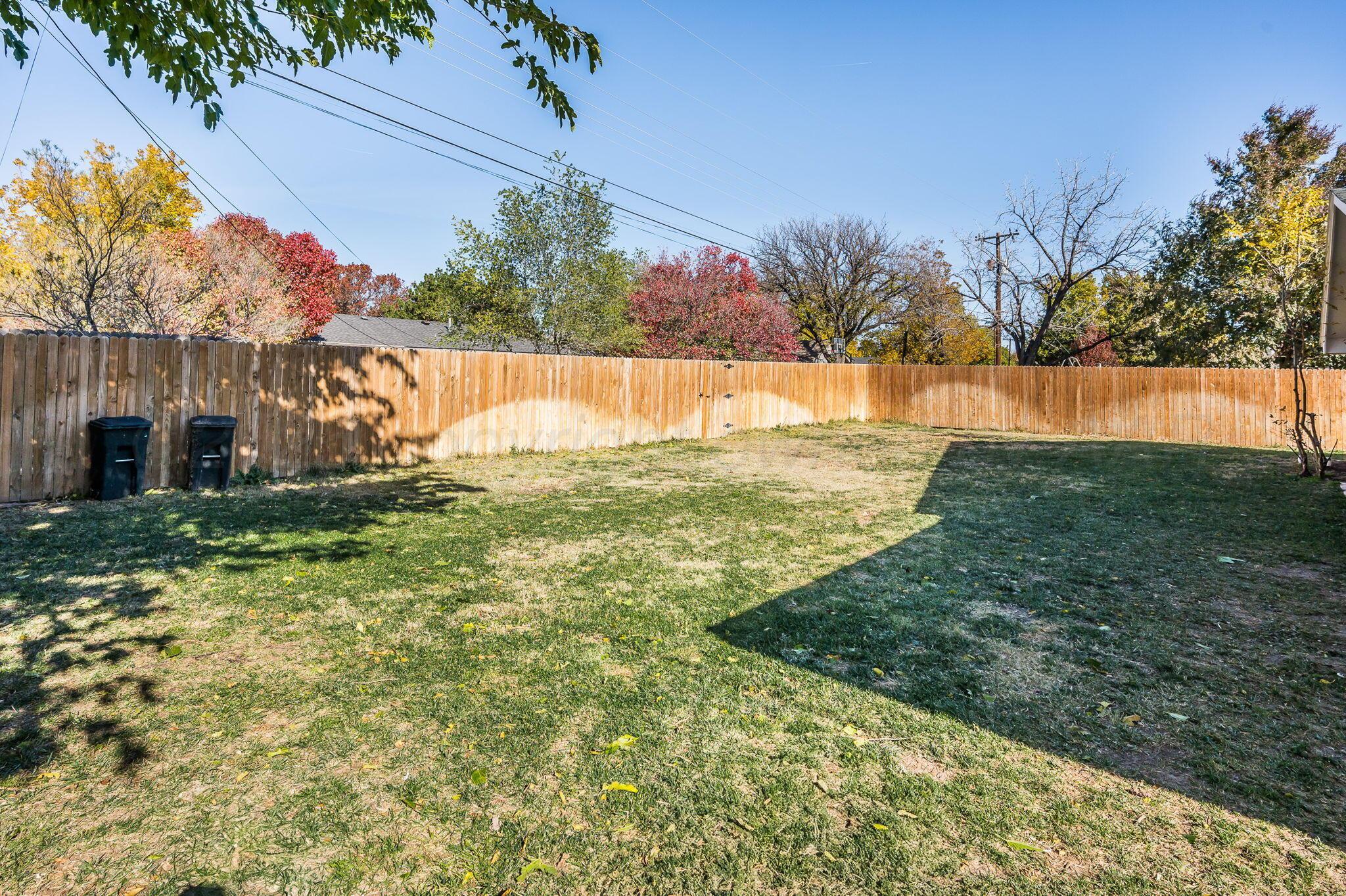 6218 Adirondack Trail Amarillo, TX 79106 - Photo 25 of 26 a view of a park with large trees