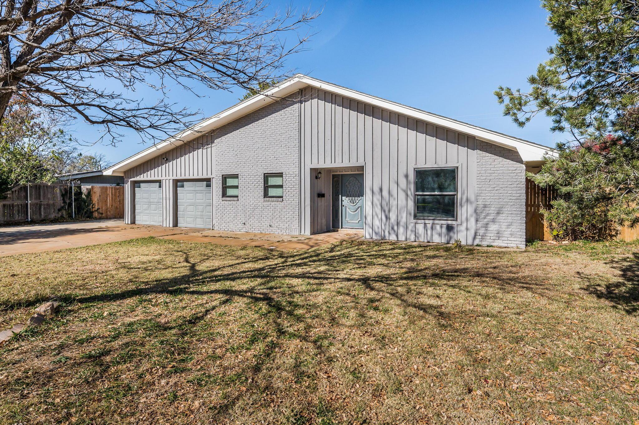 6218 Adirondack Trail Amarillo, TX 79106 - Photo 26 of 26 a view of a house with a yard