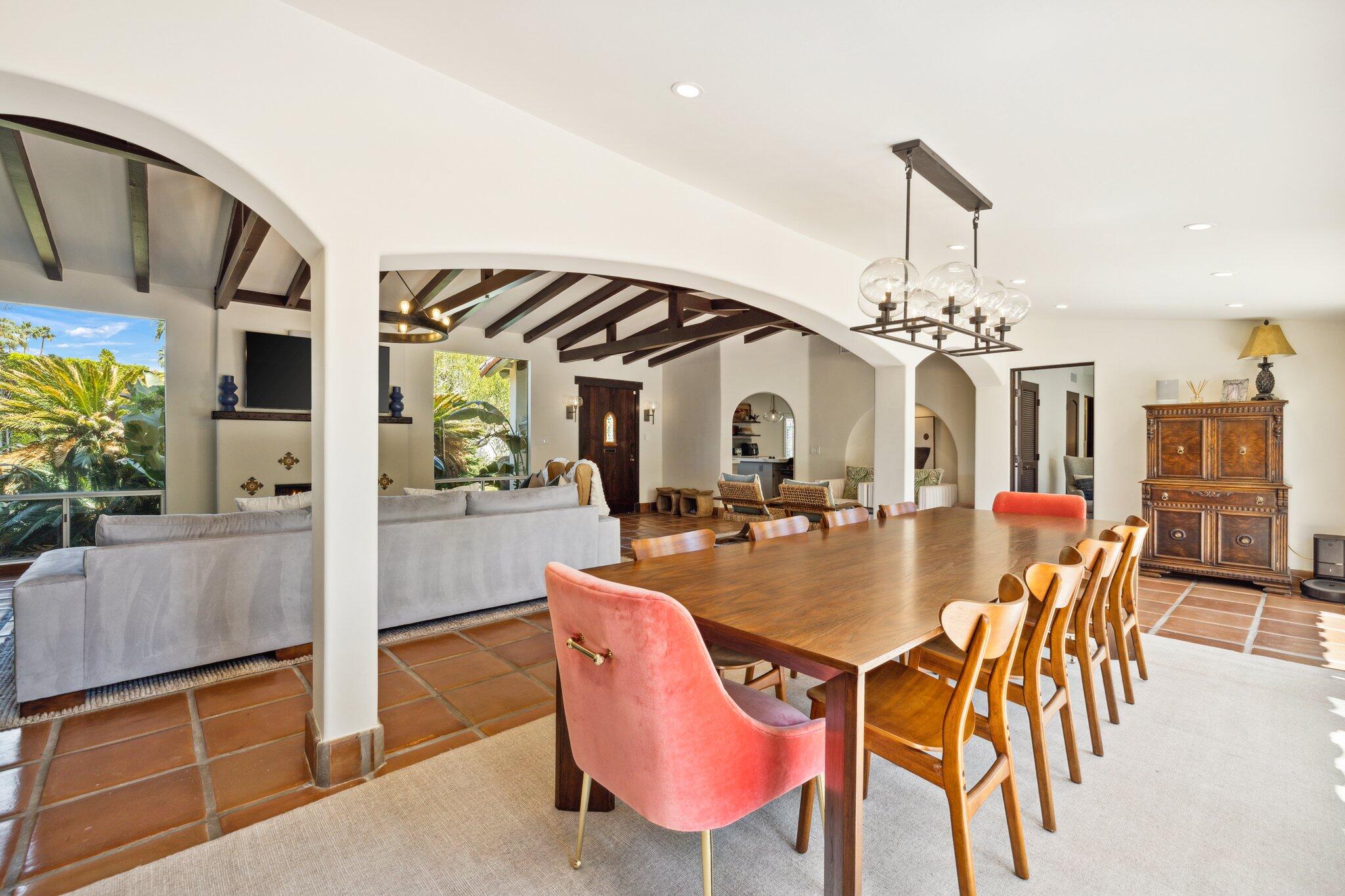 435 West Vereda Sur Palm Springs, CA 92262 - Photo 18 of 80 a view of a dining room with furniture and chandelier