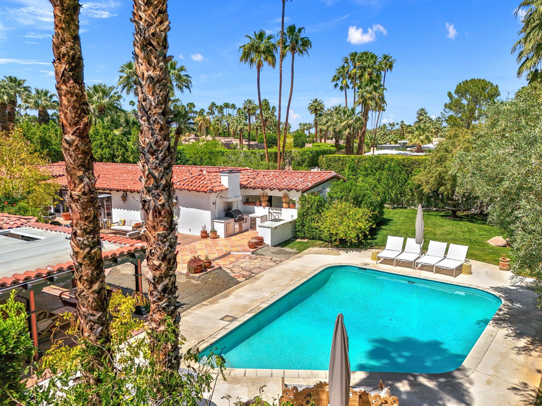 435 West Vereda Sur Palm Springs, CA 92262 - Photo 23 of 80 a view of a swimming pool with a patio