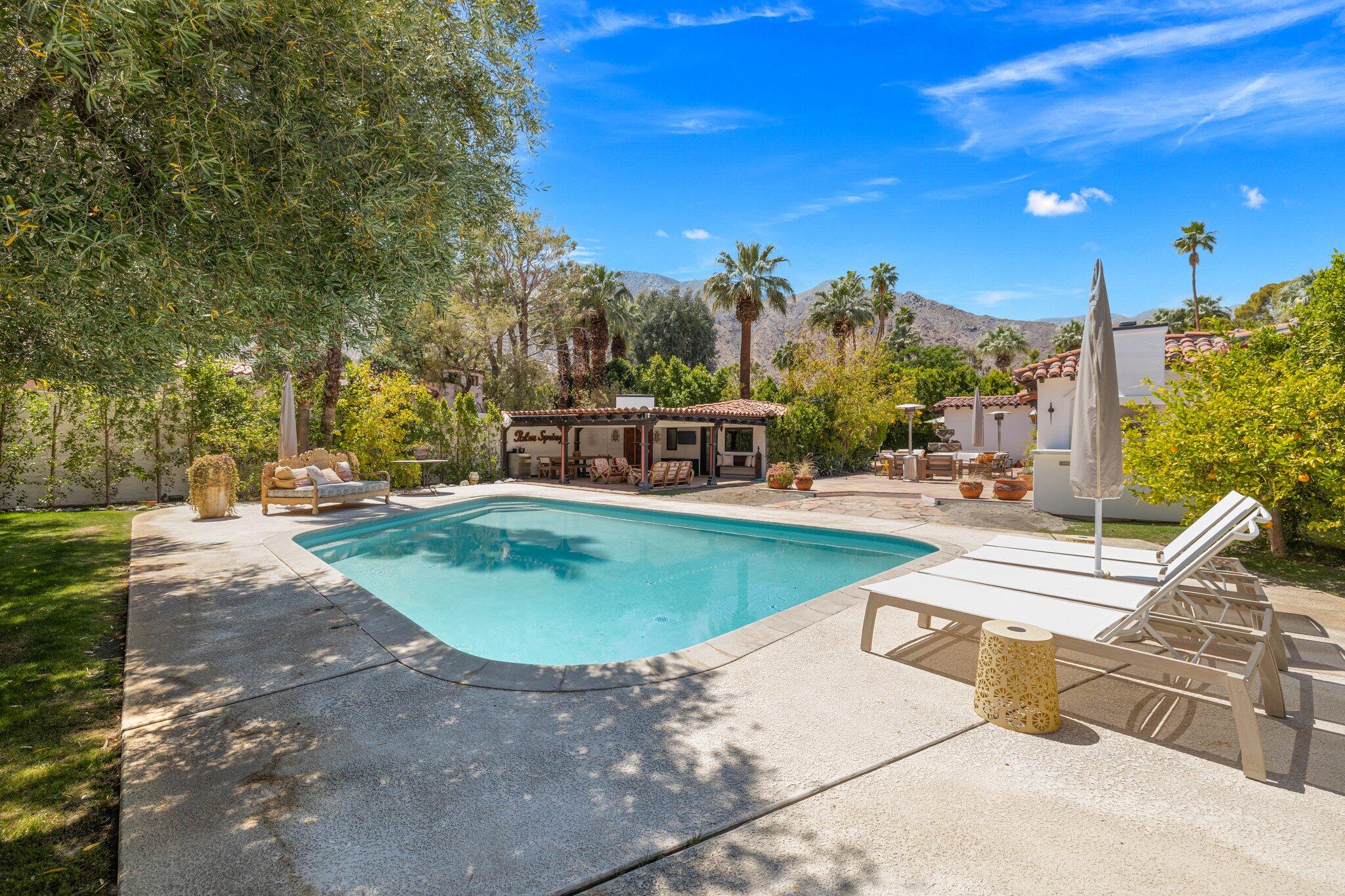 435 West Vereda Sur Palm Springs, CA 92262 - Photo 28 of 80 a view of a swimming pool with a patio